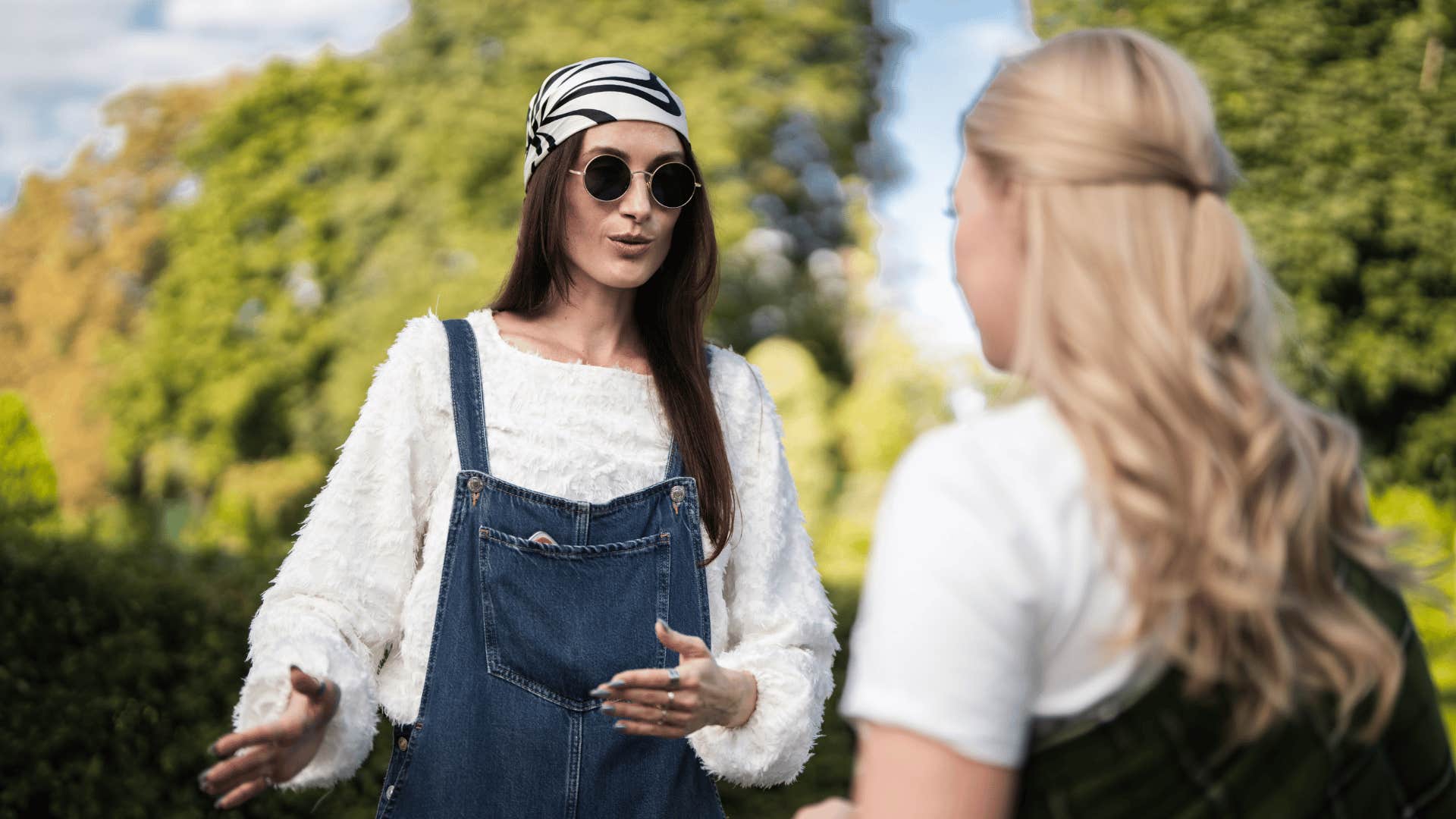 nervous woman telling her friend to forget she said anything