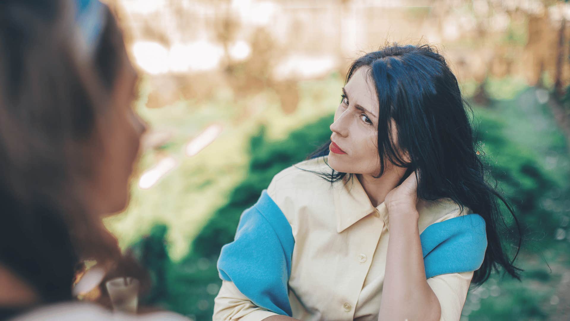 nervous woman saying ignore me during a casual conversation