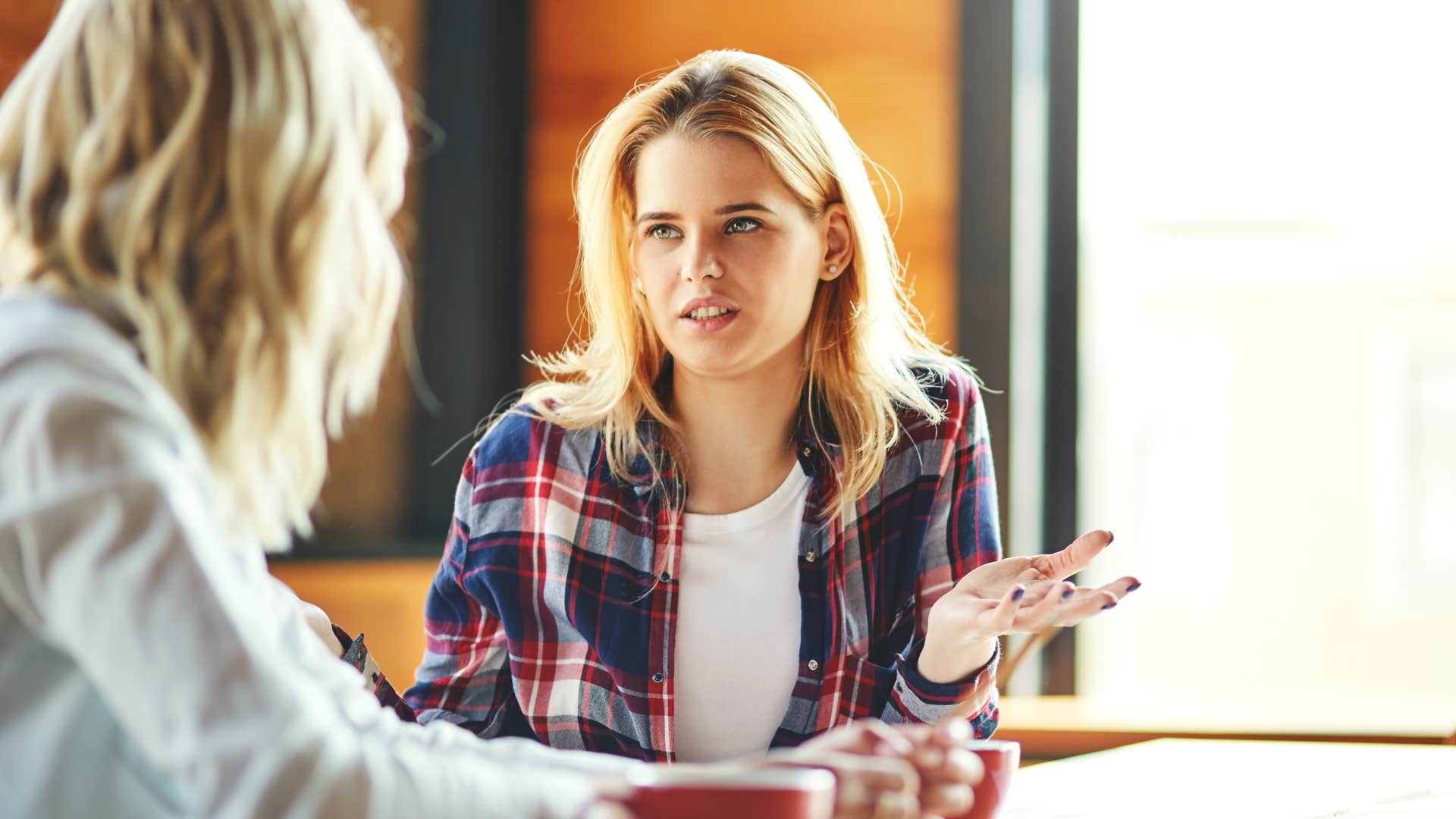 woman asking friend if she actually likes that