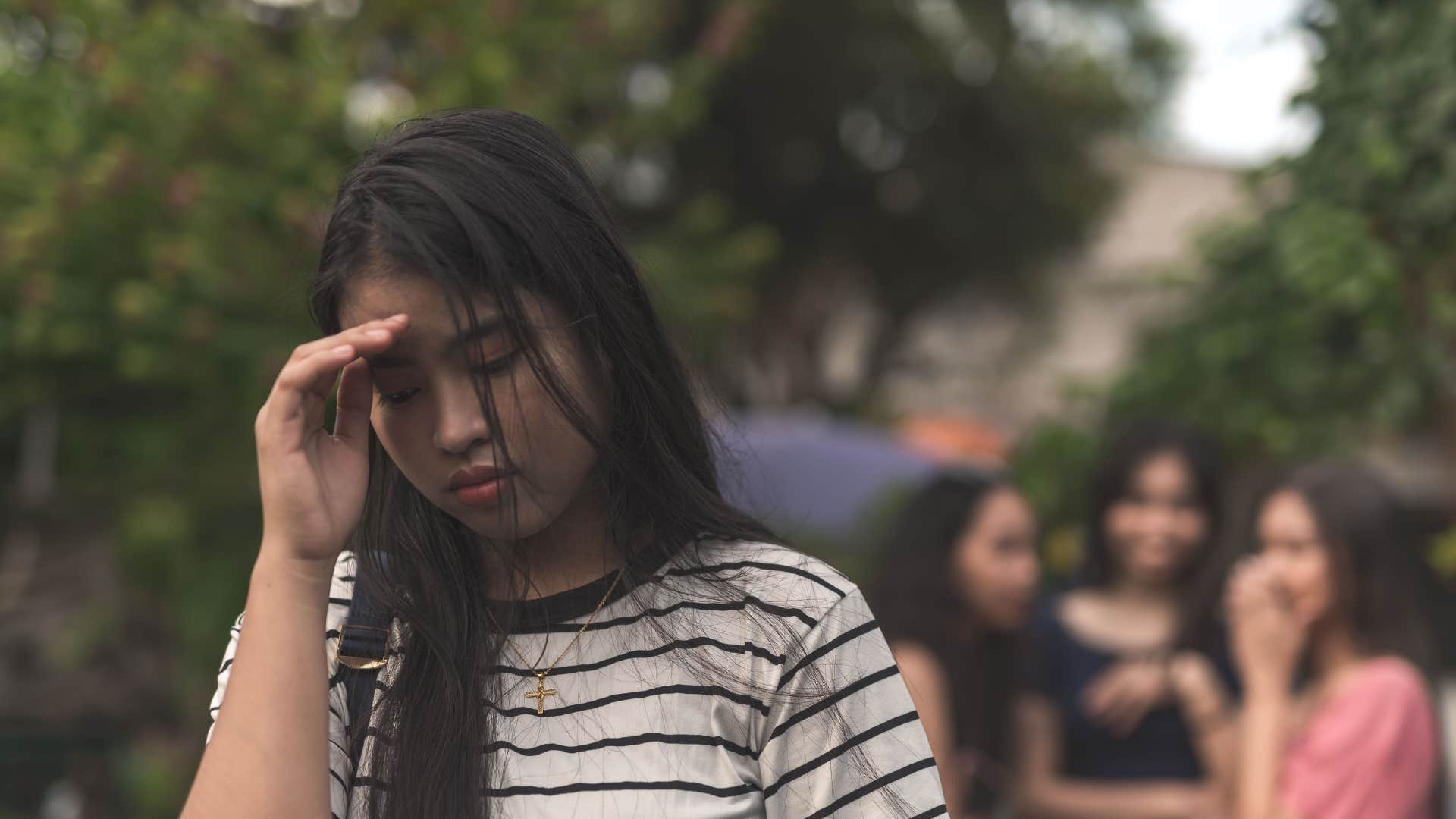woman being made fun of by friends asking if she actually believes that