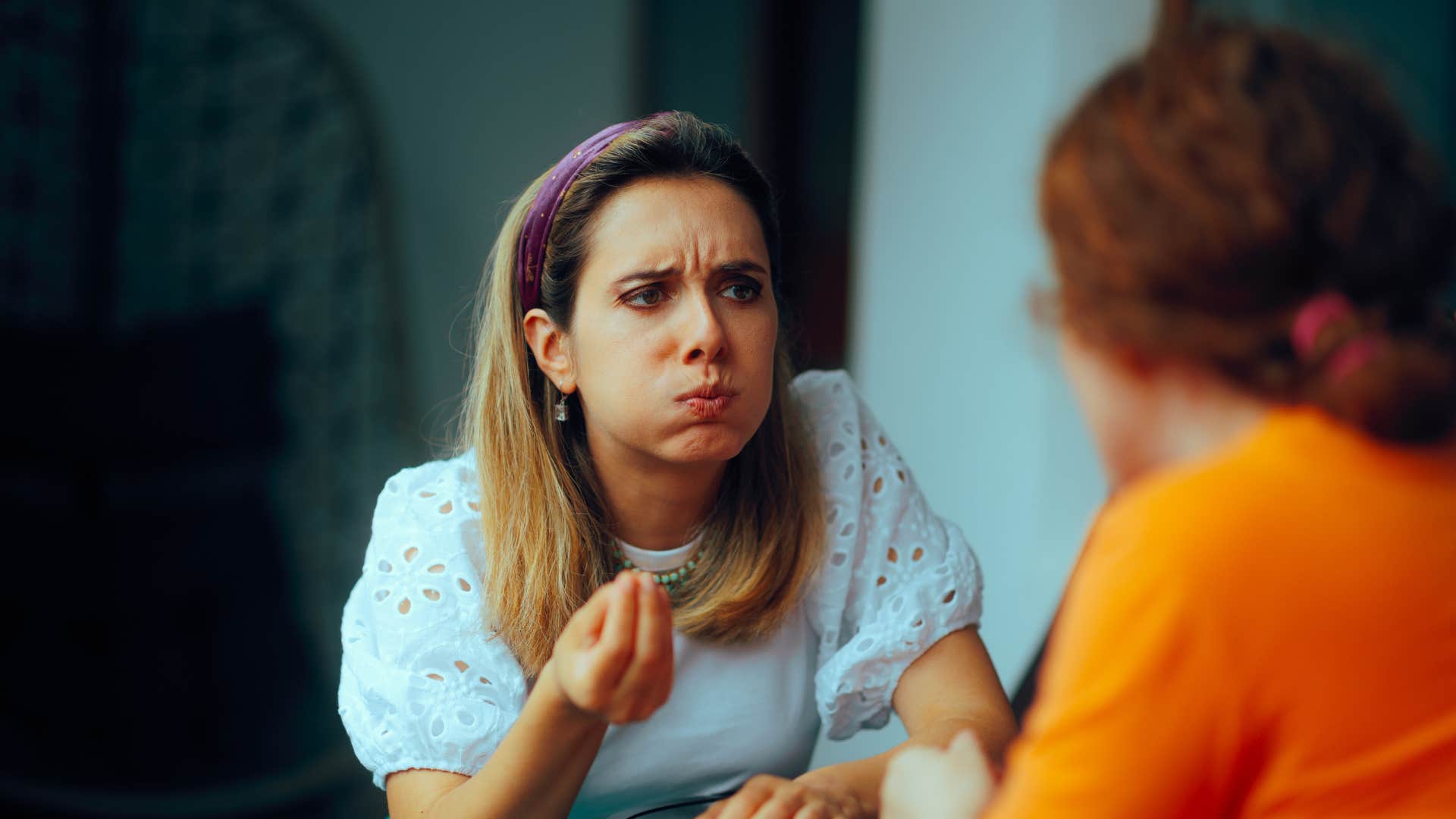 woman asking friend if she can take criticism