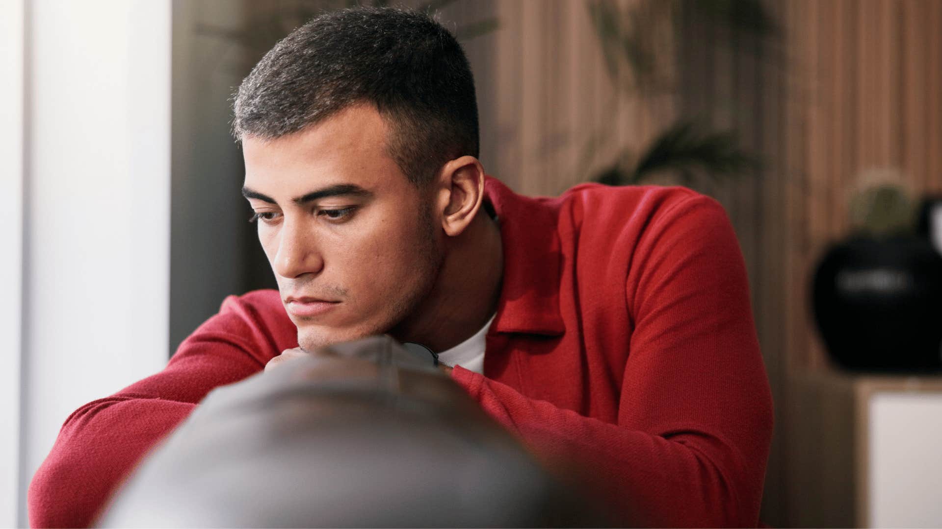 emotionally numb man at home feeling nothing