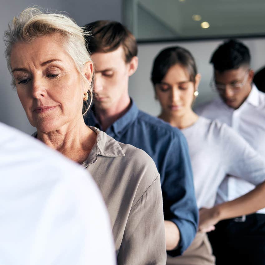 unemployed people lining up for a job interview