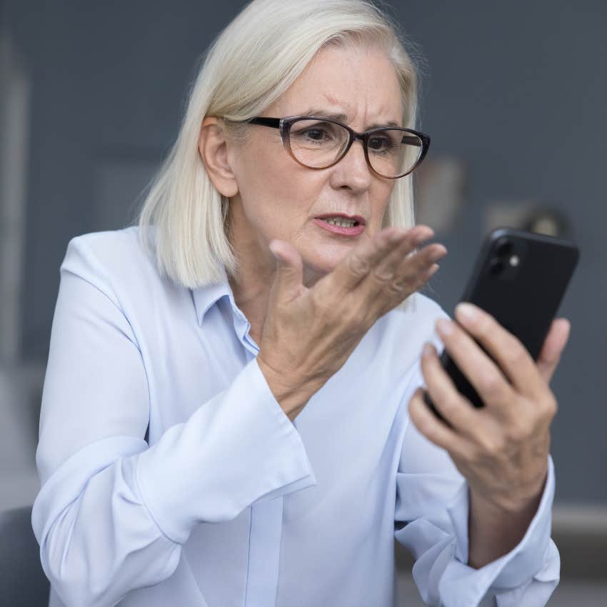 mom arguing with her son on the phone about her job search