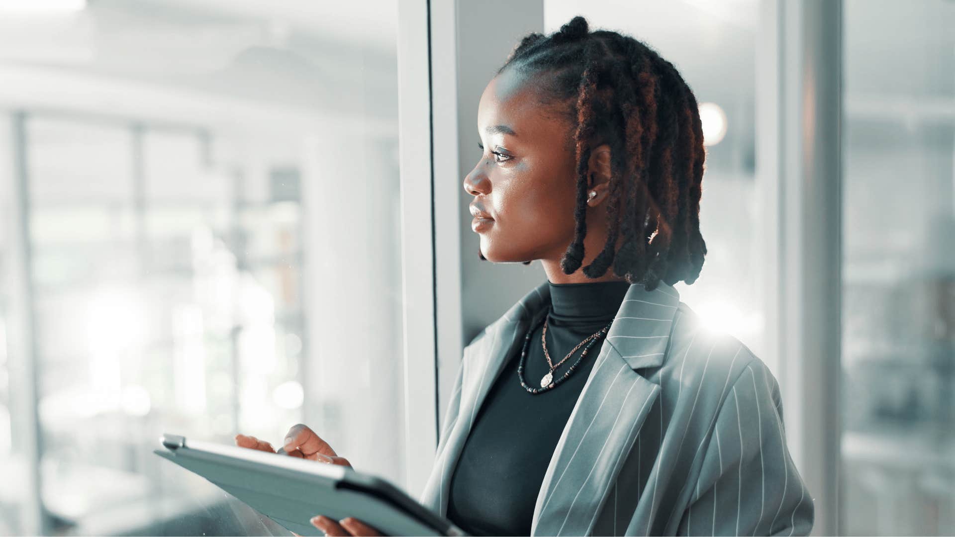 introverted woman standing quietly at work