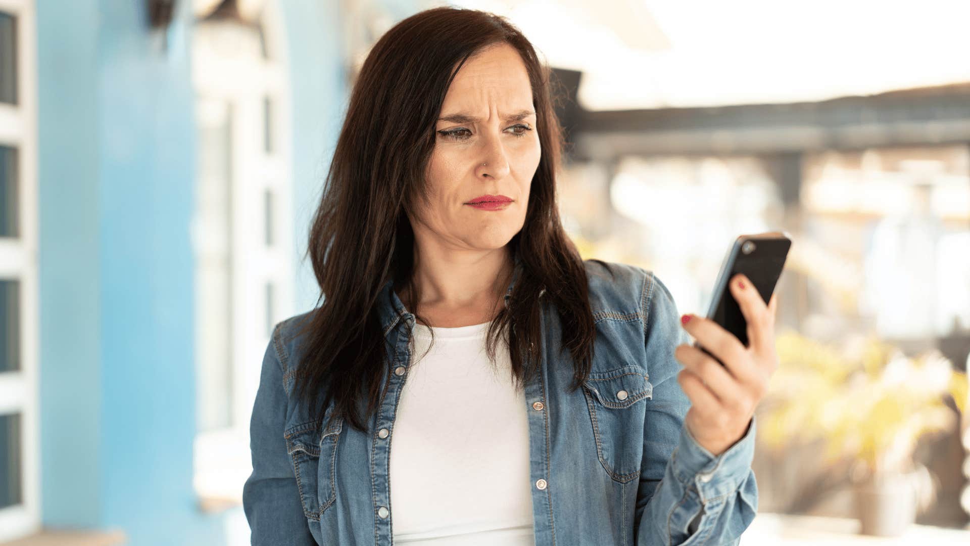introverted woman annoyed someone is calling instead of texting her