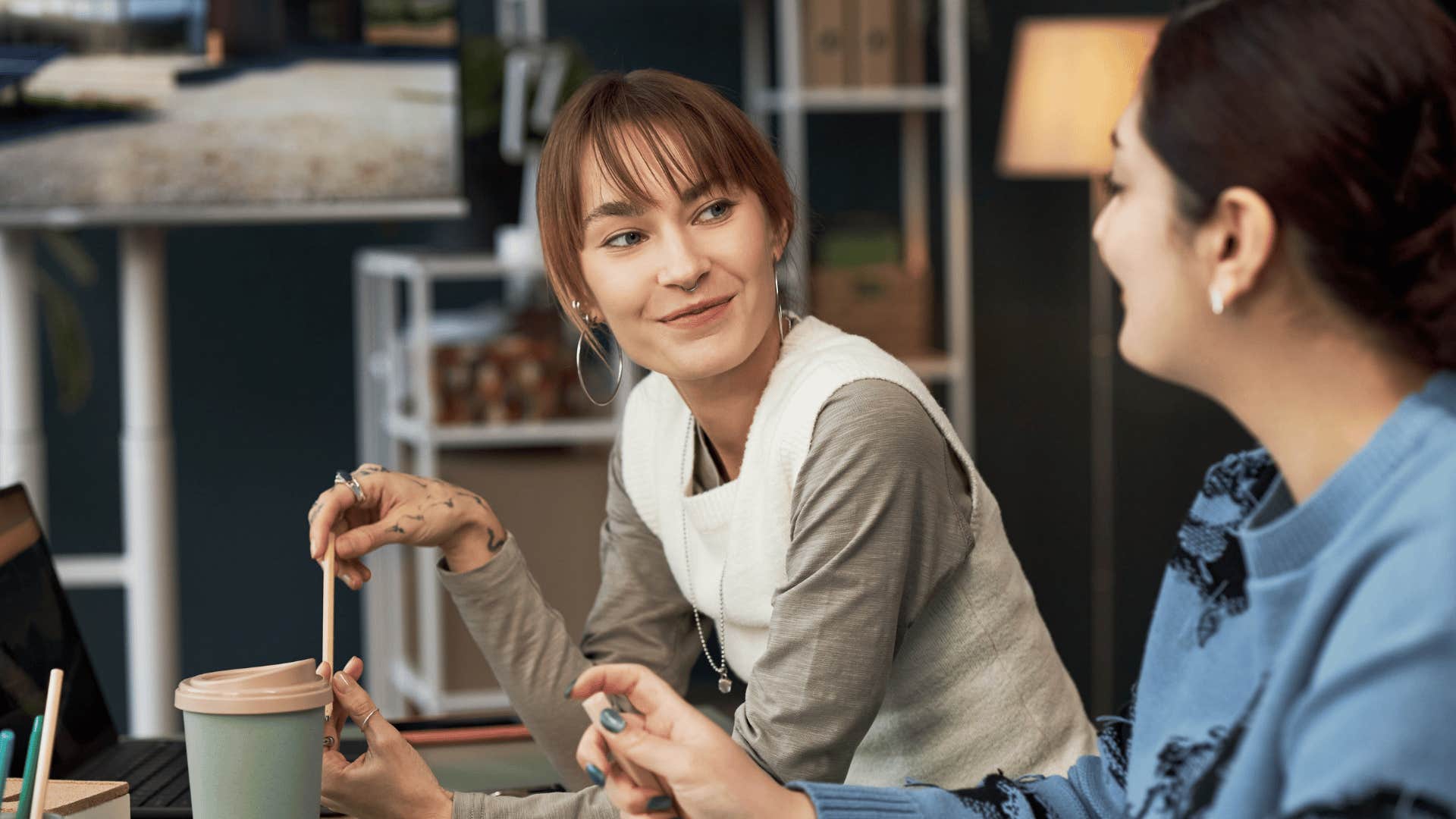 woman listening to acquaintance talk with no substance