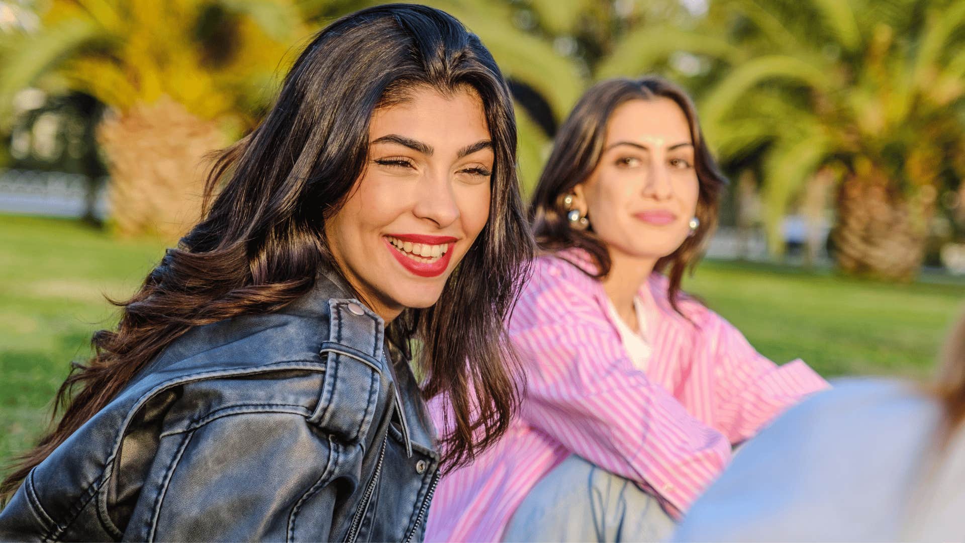 woman sitting with friend turning their hangout into a group activity