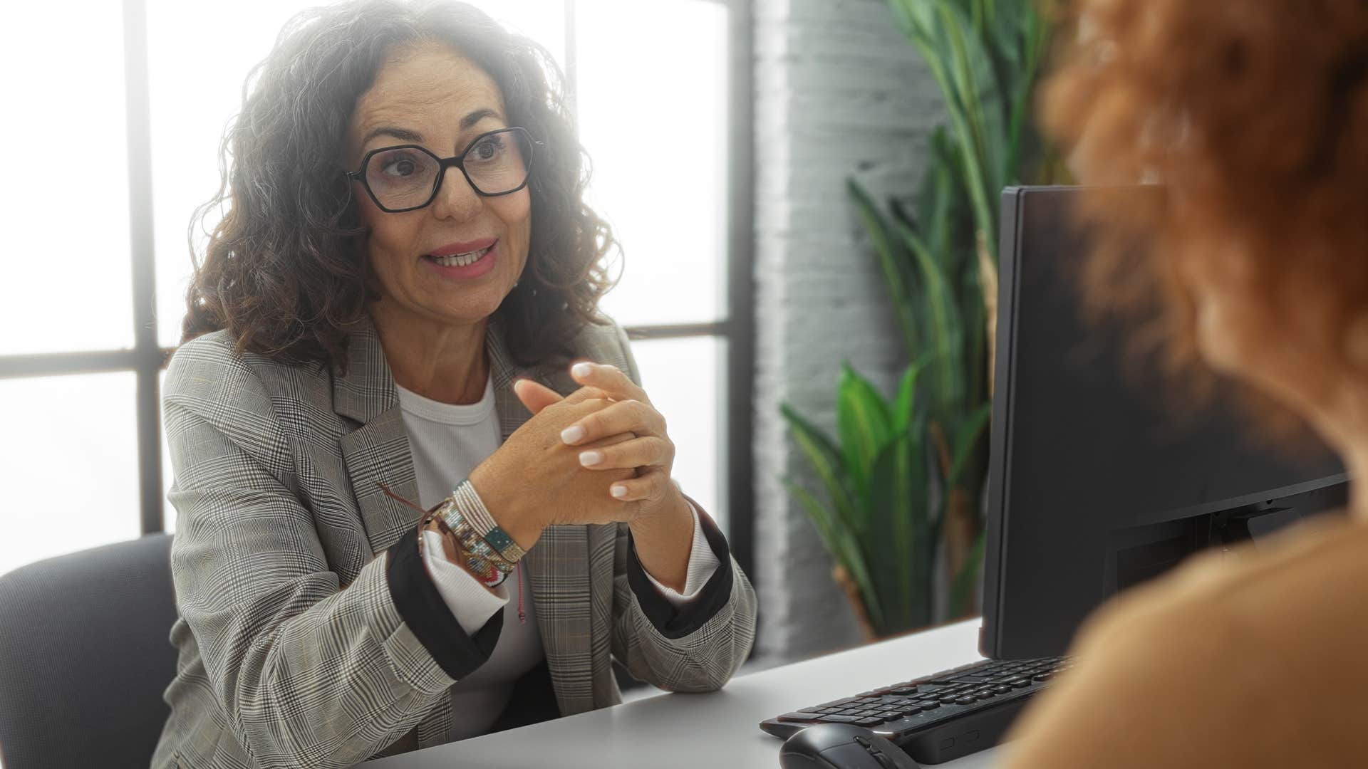 woman telling colleague I don't have time for this