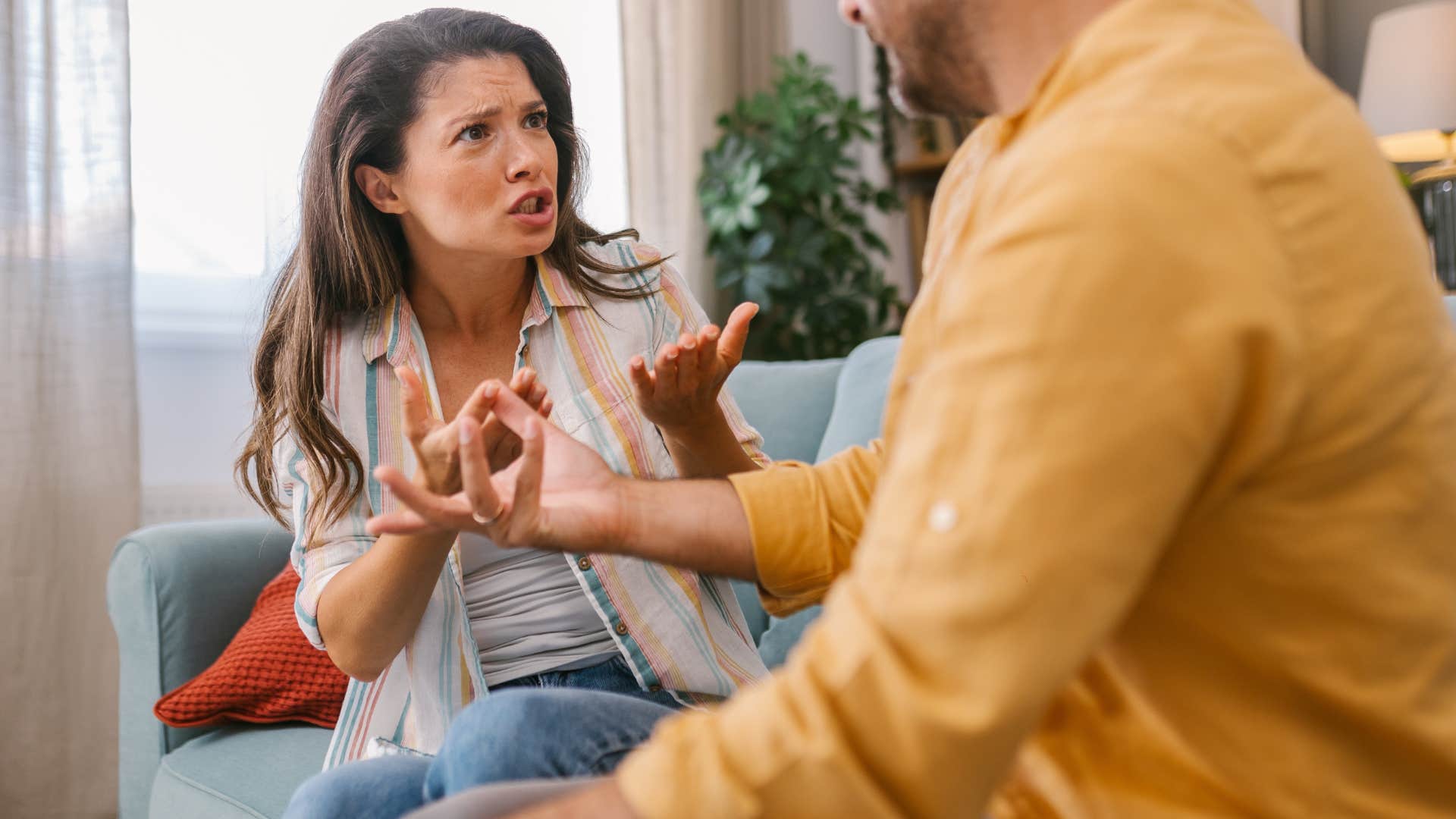 woman telling her husband you make me crazy