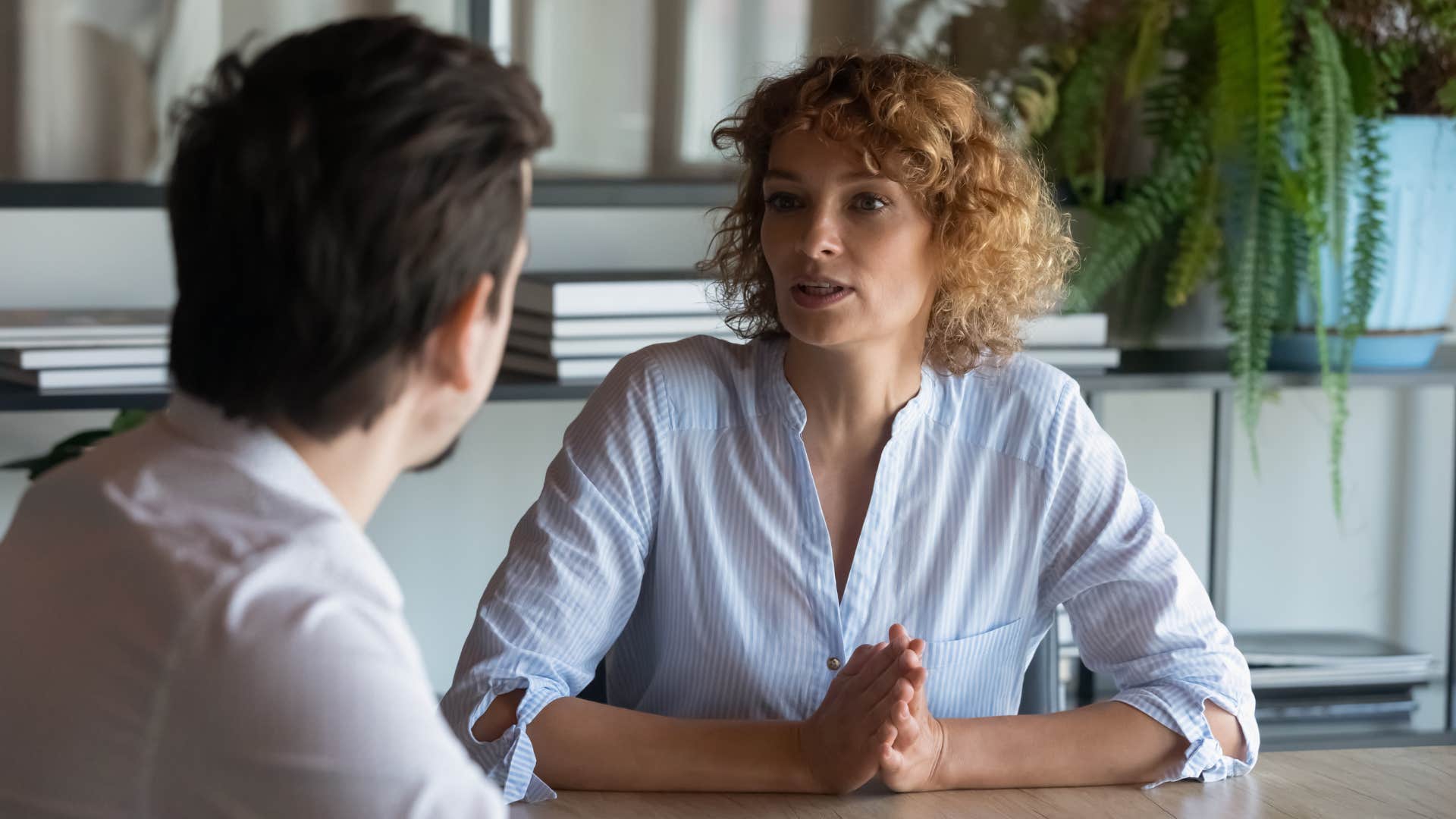 woman refusing to chase boss for a raise at work