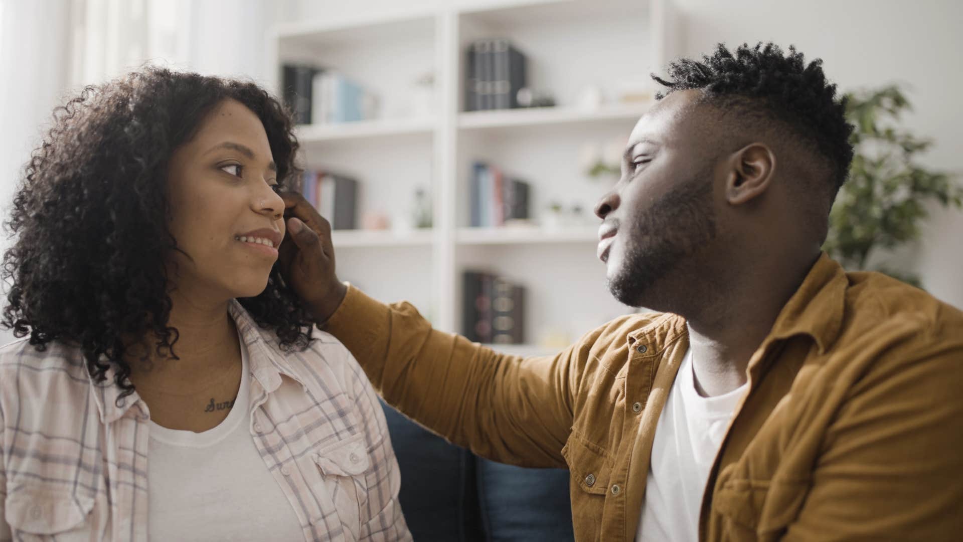 charismatic man intentionally offering compliments to his partner