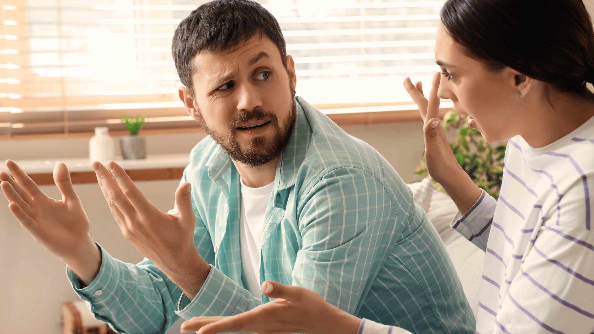 man shutting down debate with partner after feeling uncertain certain