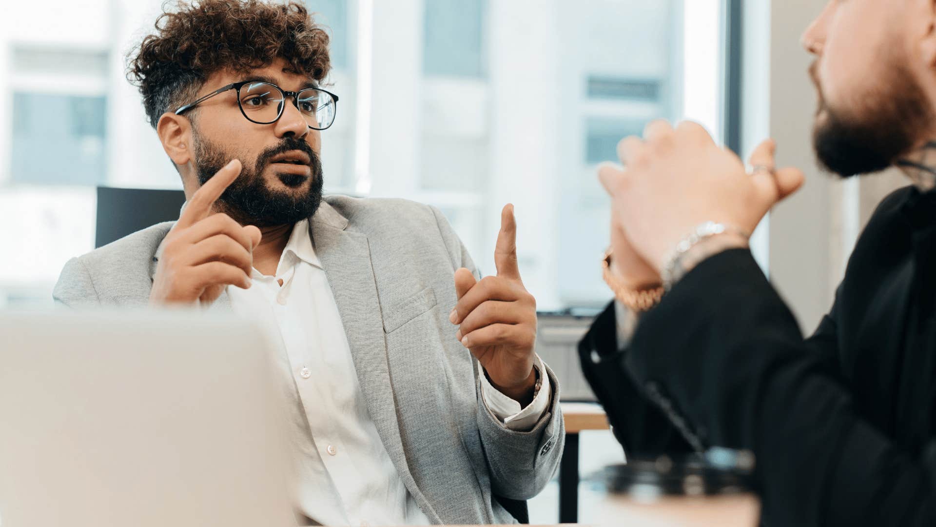 man using overly complex words at work