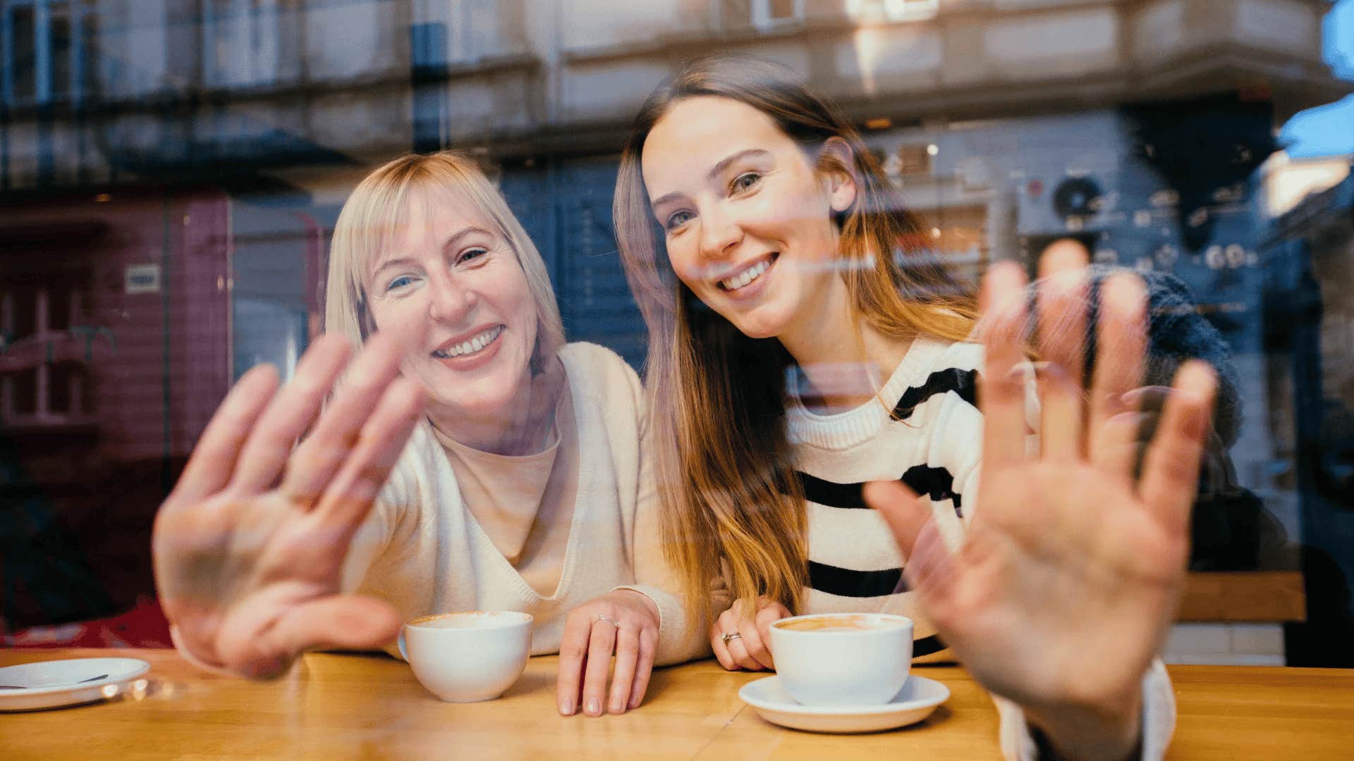 mother and daughter having coffee teaching her that she'll always know what to do as an adult