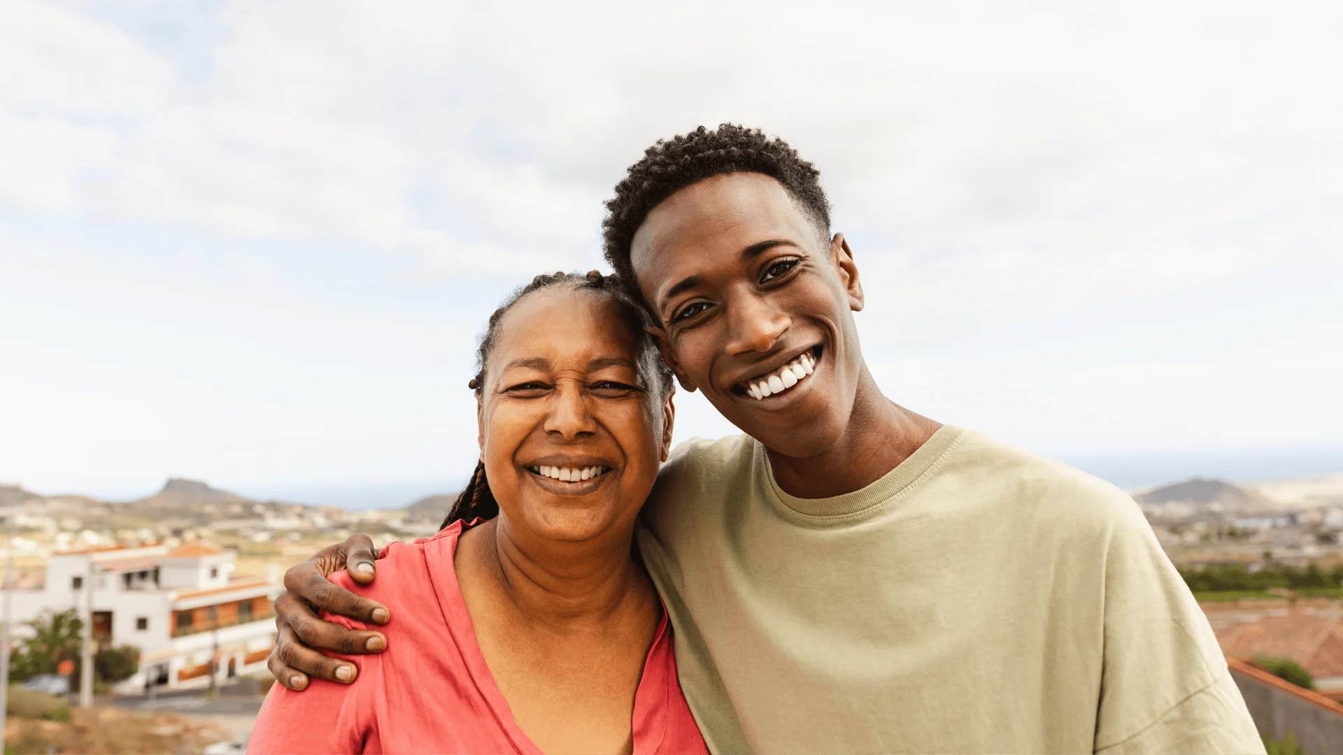 mother and son hugging after telling him he will have life figured out by 18
