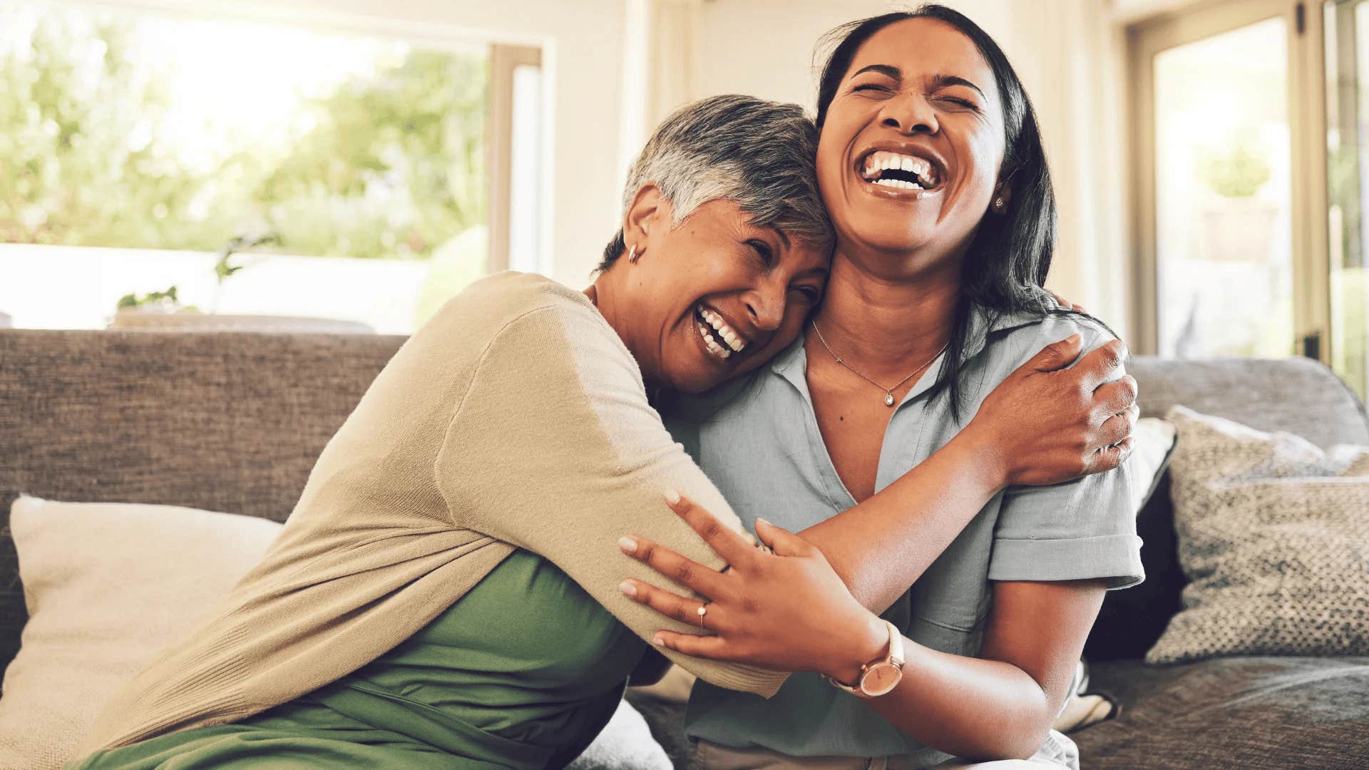 mom laughing with daughter telling her life gets easier as you age