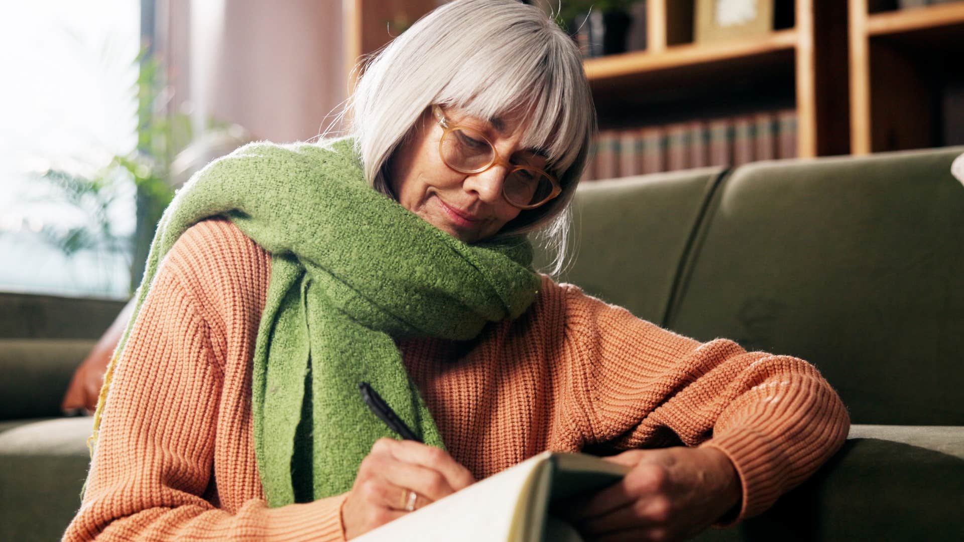 woman journaling every day to relieve stress
