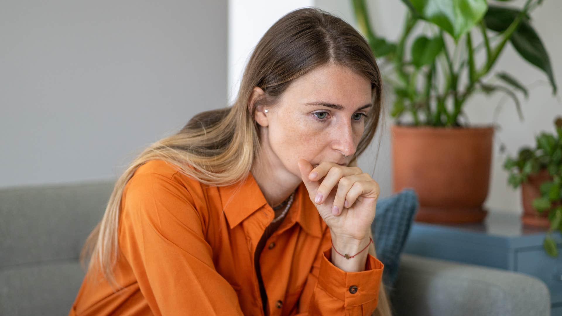 pensive woman feeling stressed saying i don't want to think about it
