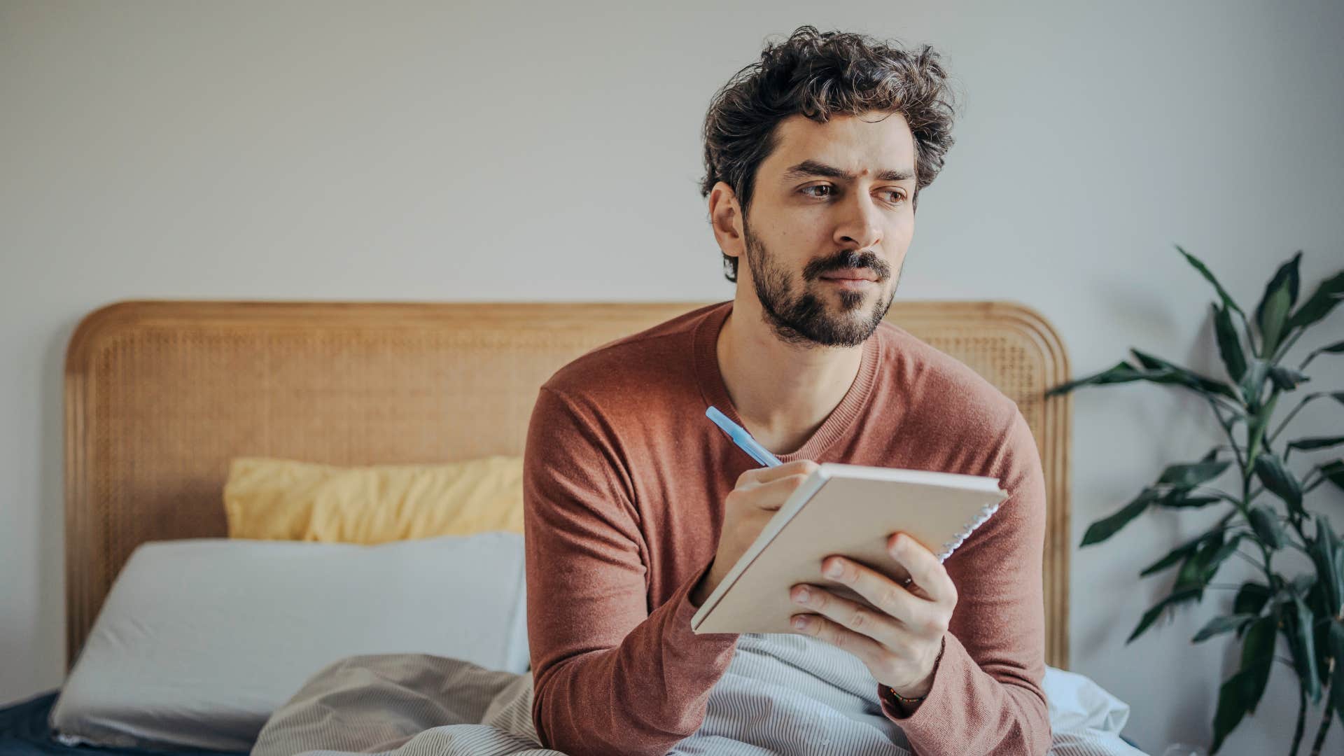 man with strong analytic thinking skills writing 