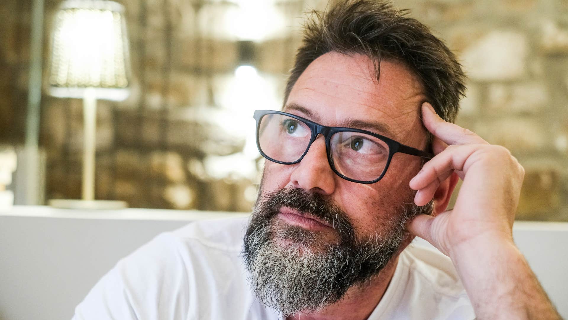 pensive man thinking about reactions of others