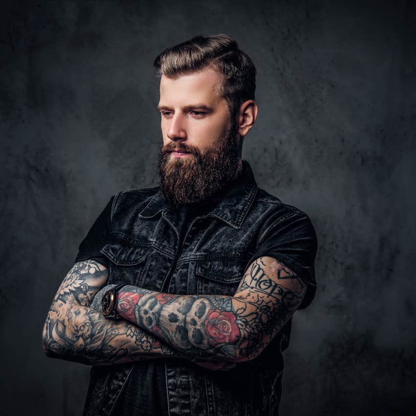 man expressing his identity through tattoos