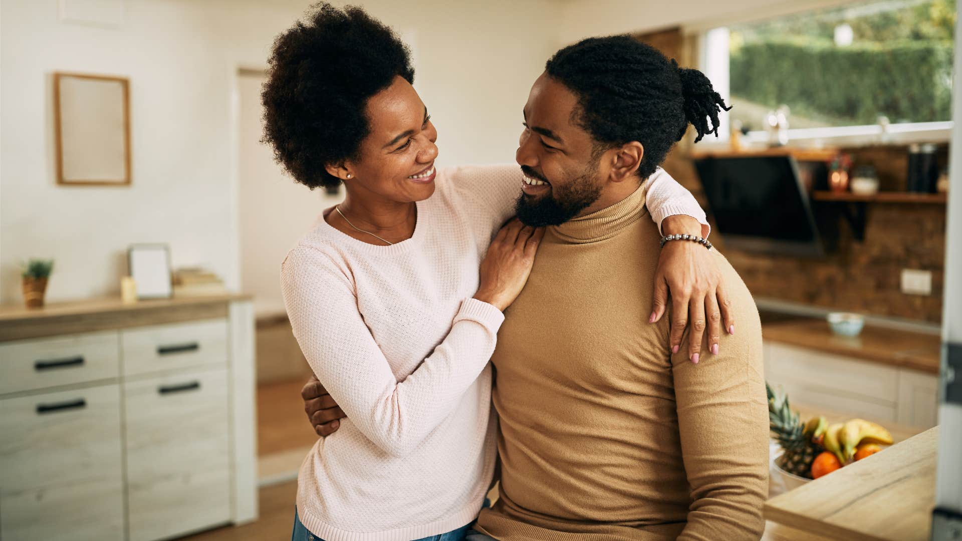 supportive couple encouraging each other to invest in their other personal relationships