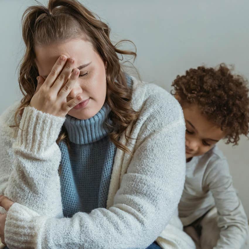 mom feeling stressed about modern parenting