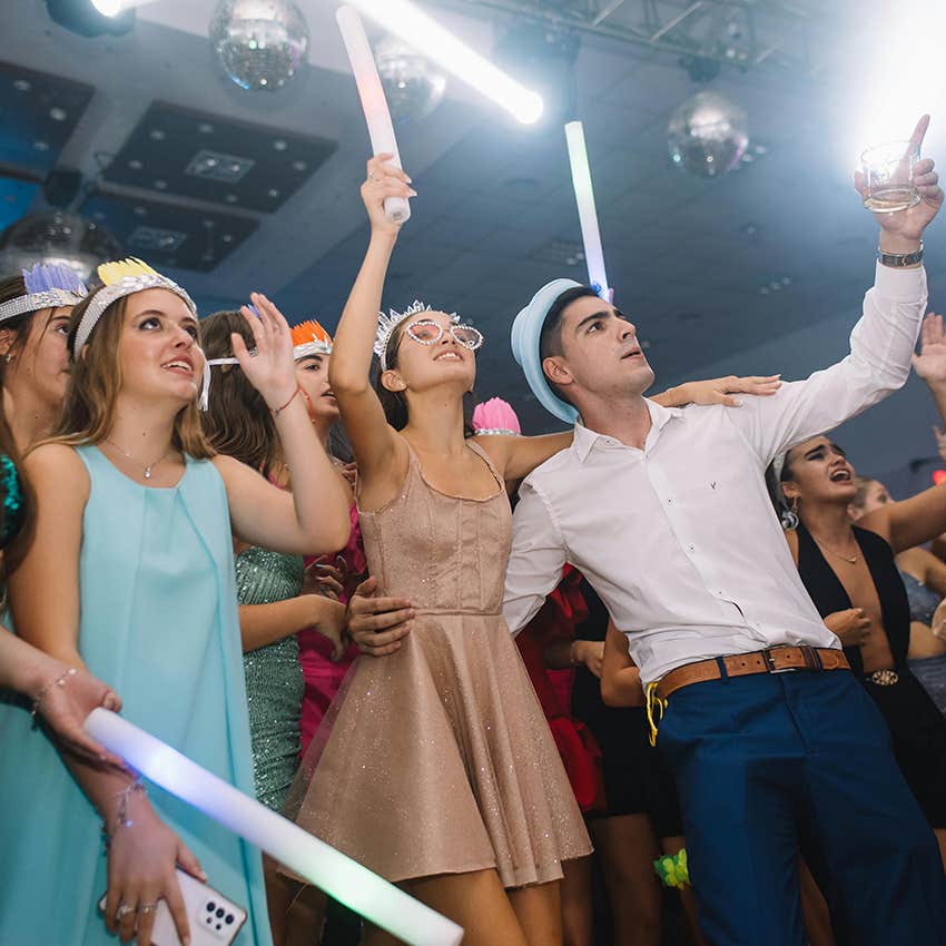 group of friends singing at prom