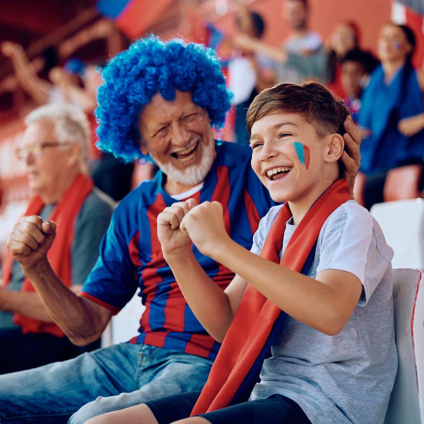 grandfather and grandson cheering for same team identify with team
