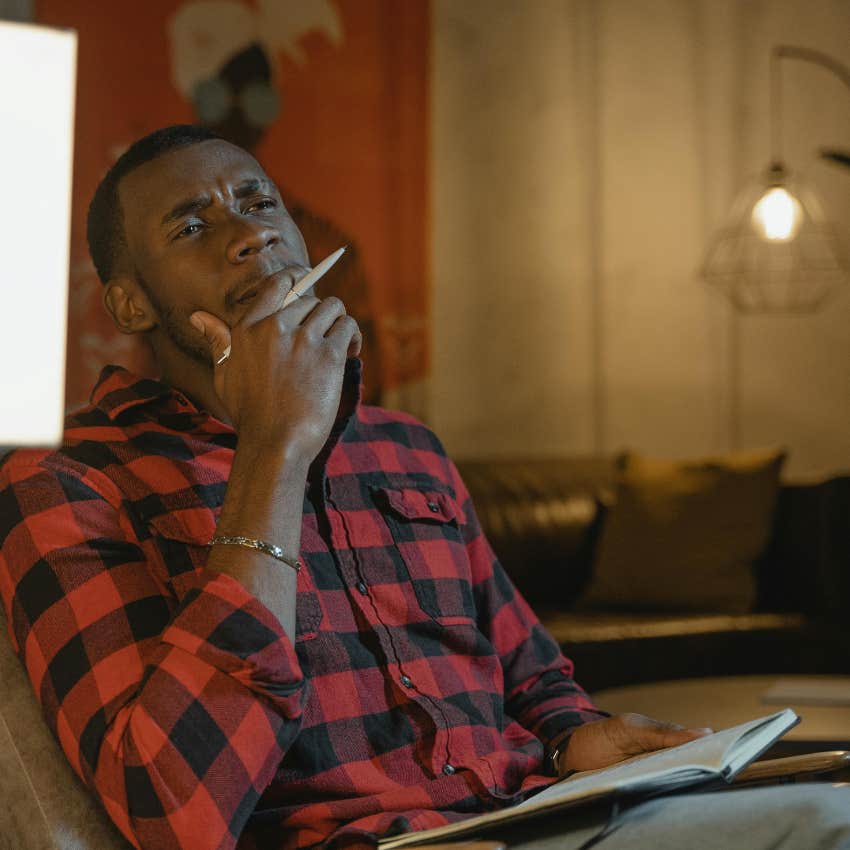 man thinking about new information and changing is prior thinking