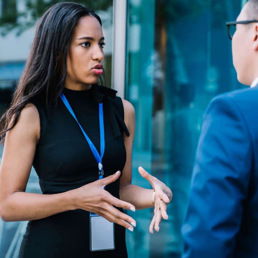 intelligent woman questioning things openly with work colleague