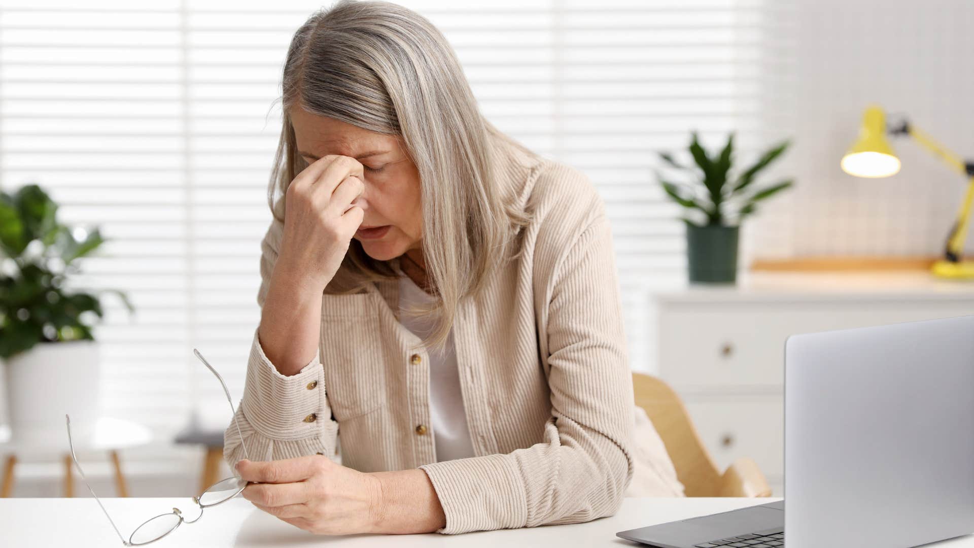 Woman dealing with burnout at work.