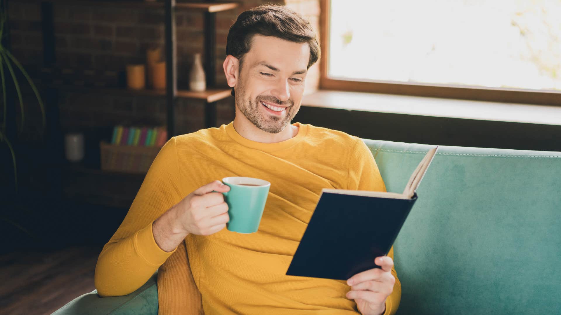 good man who feels comfortable being alone reading at home