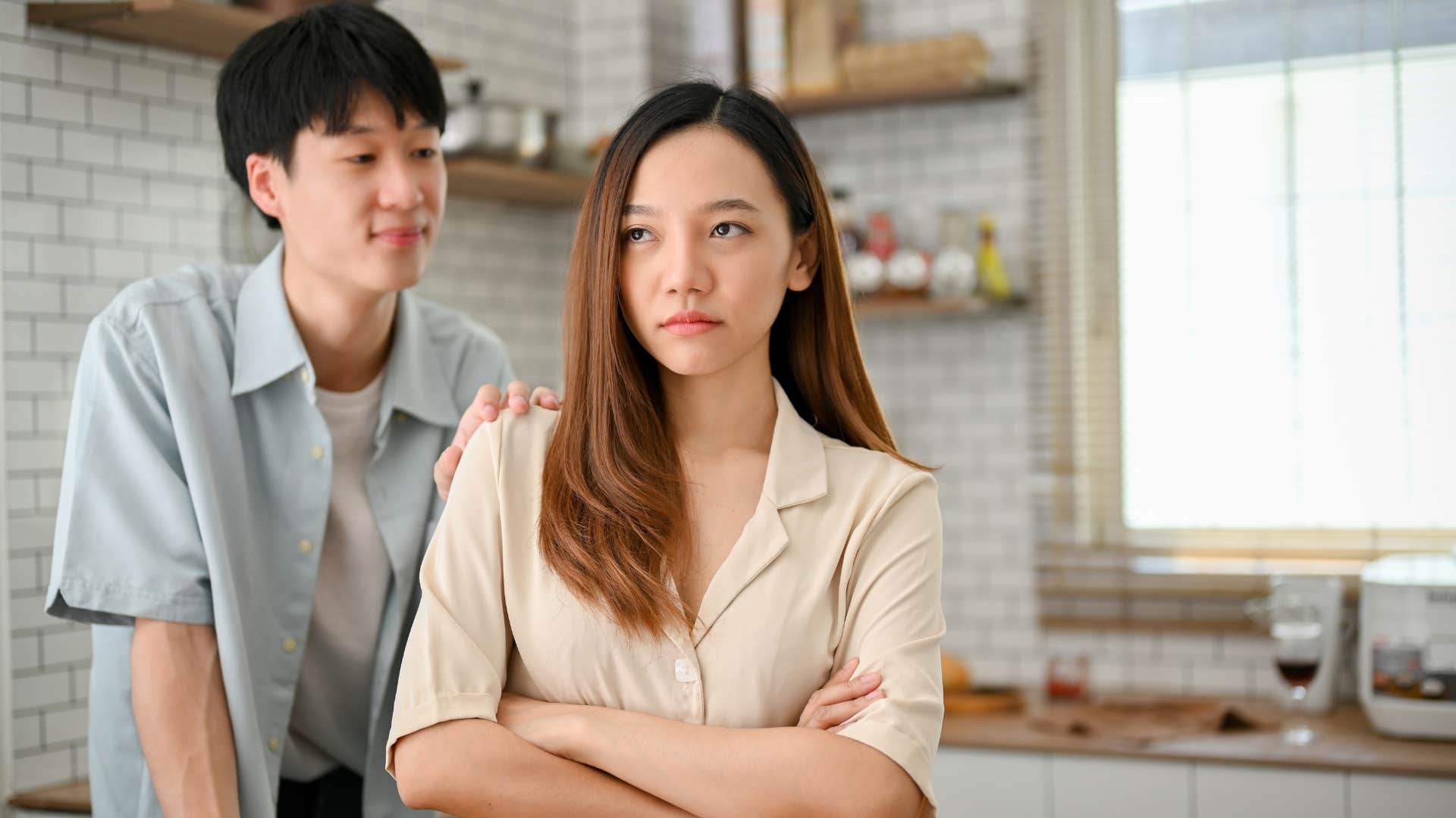 man owning up to mistakes apologizing to woman