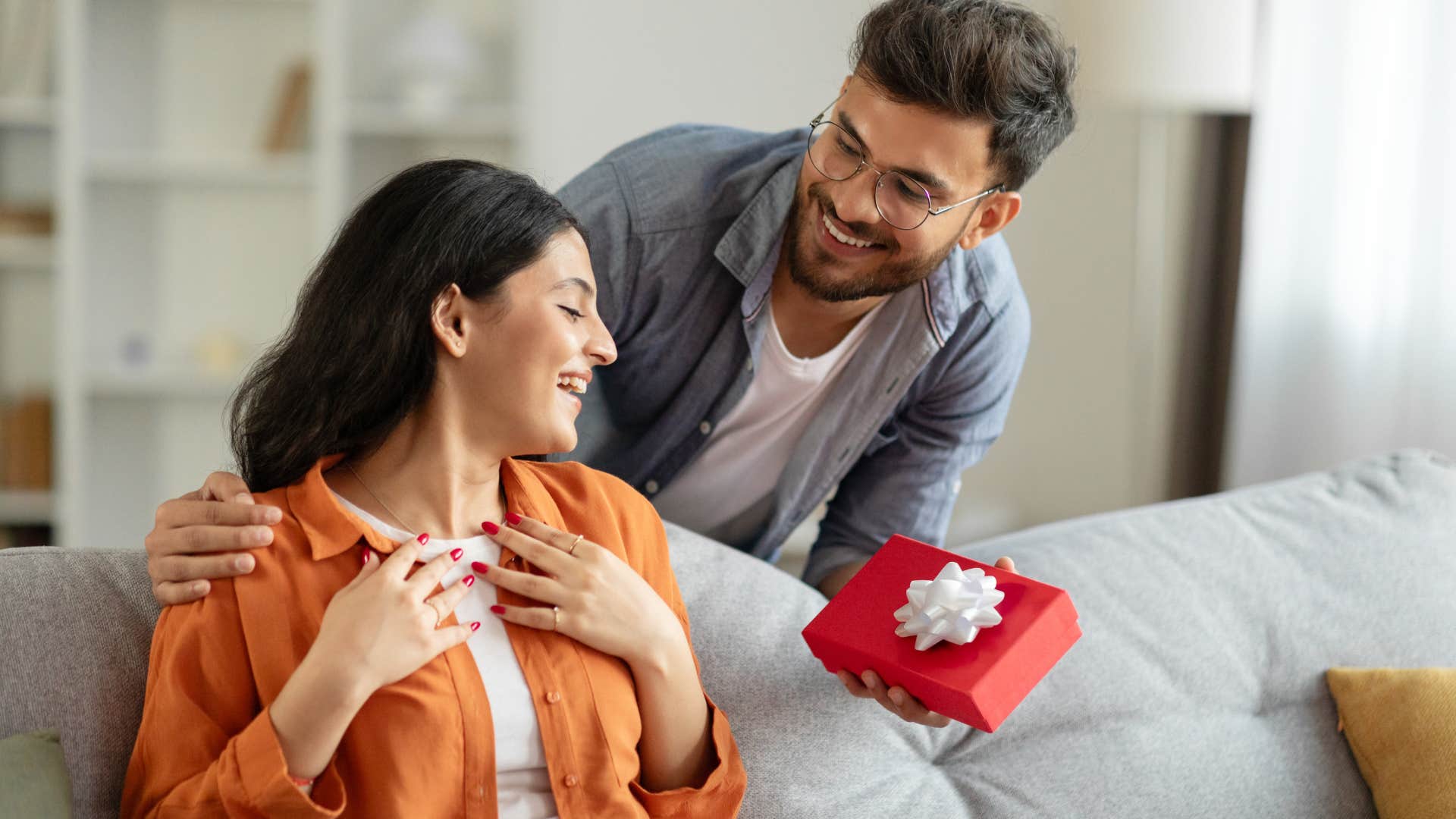 good man thinking of others giving partner a gift for no reason