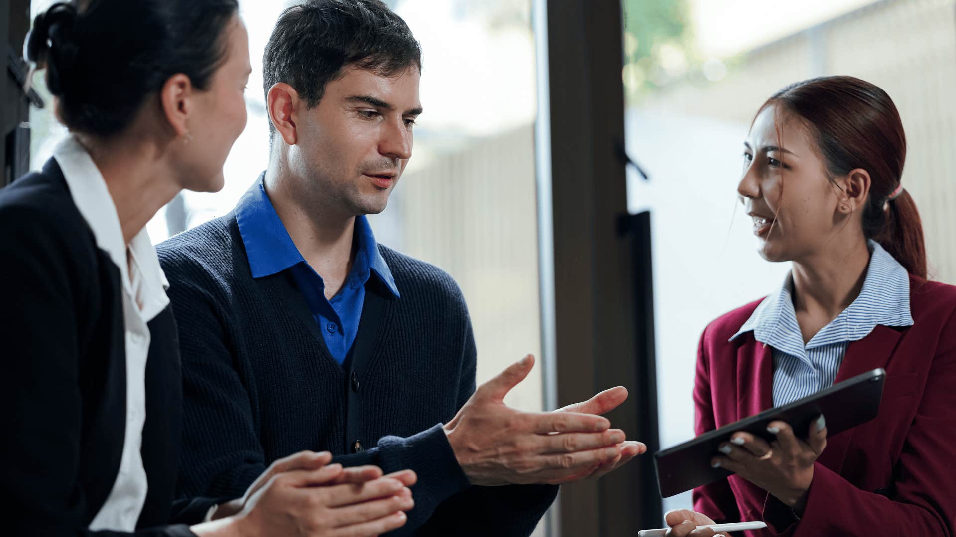 Man making assumptions confidently at work.
