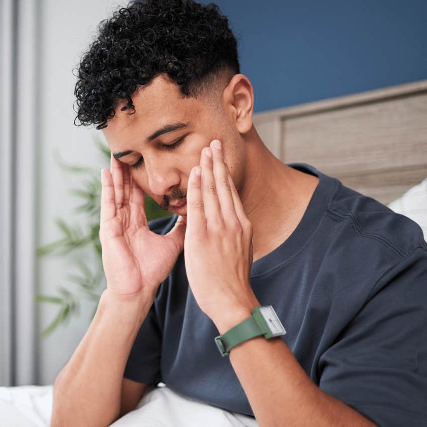 miserable man focusing on what he's worried about in bed