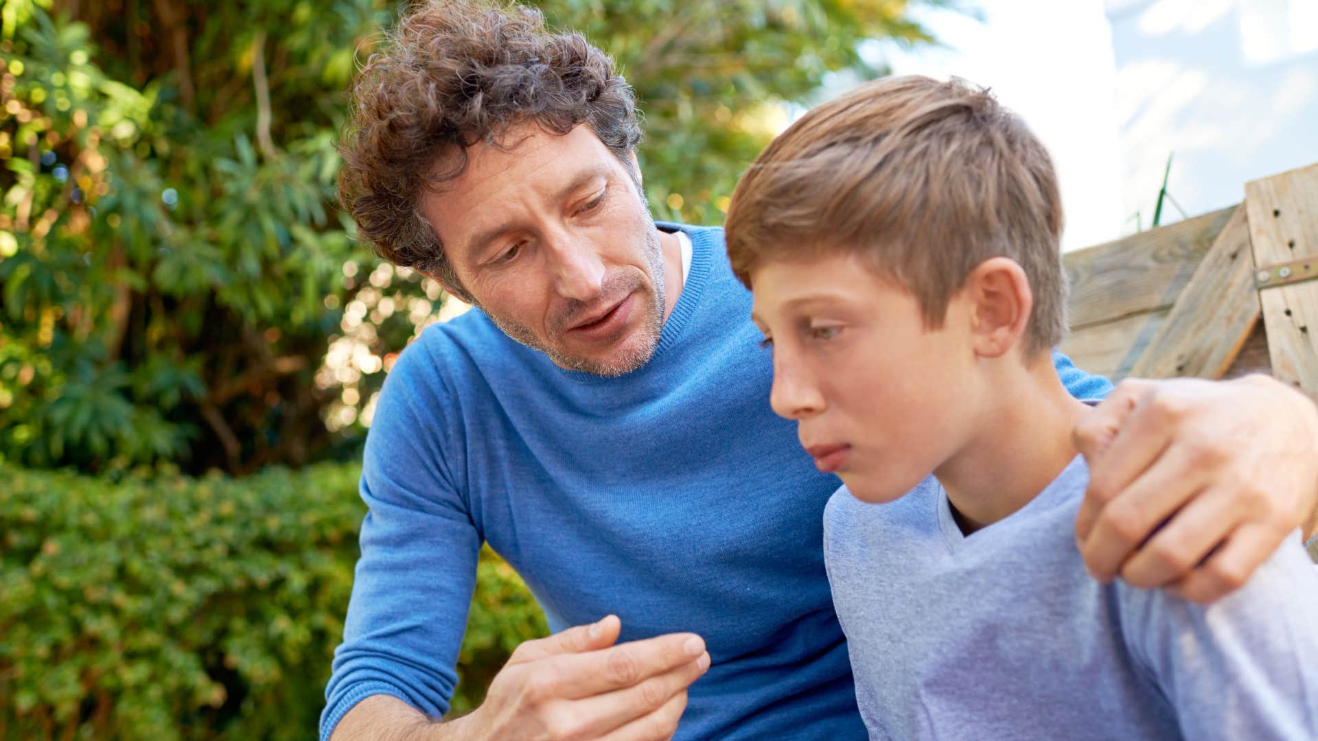father expecting his oldest son to mature early having a talk with him