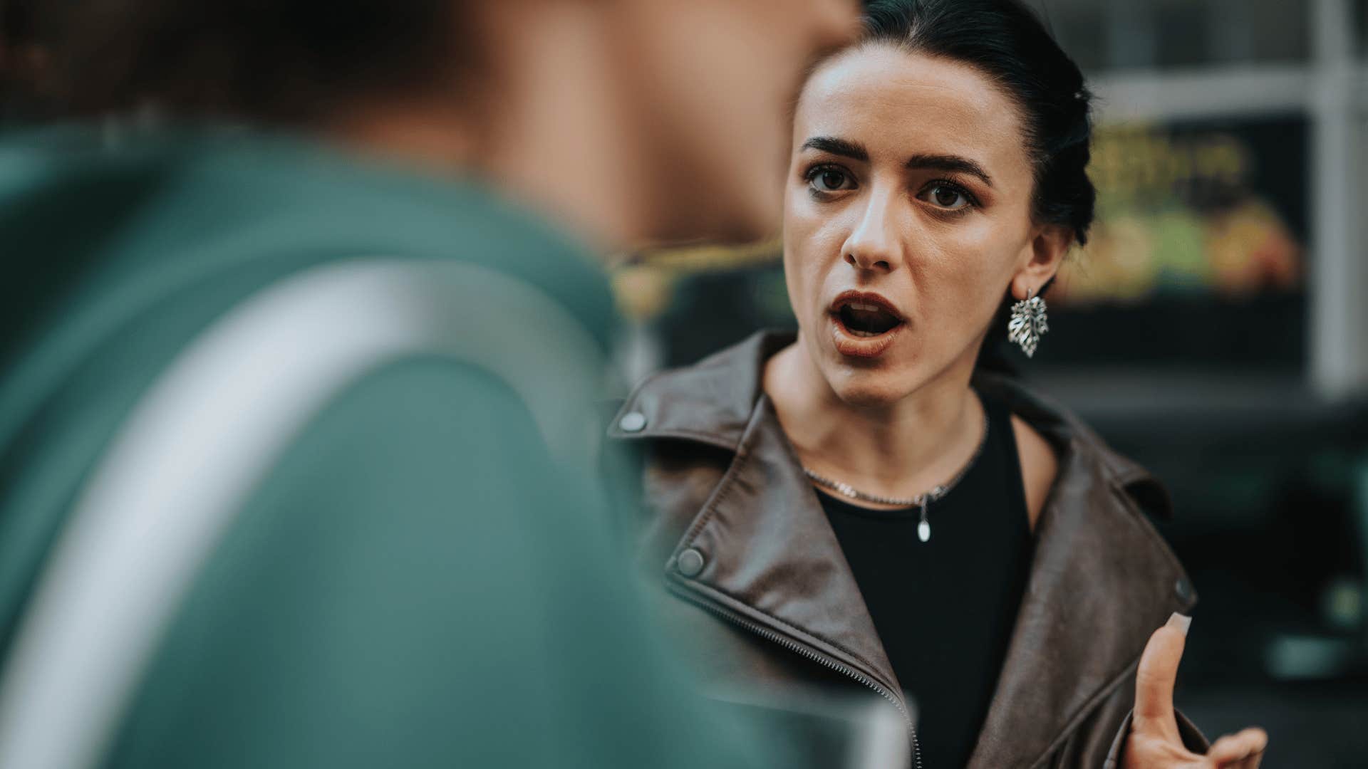 woman noticing her partner's social awareness in heated discussion