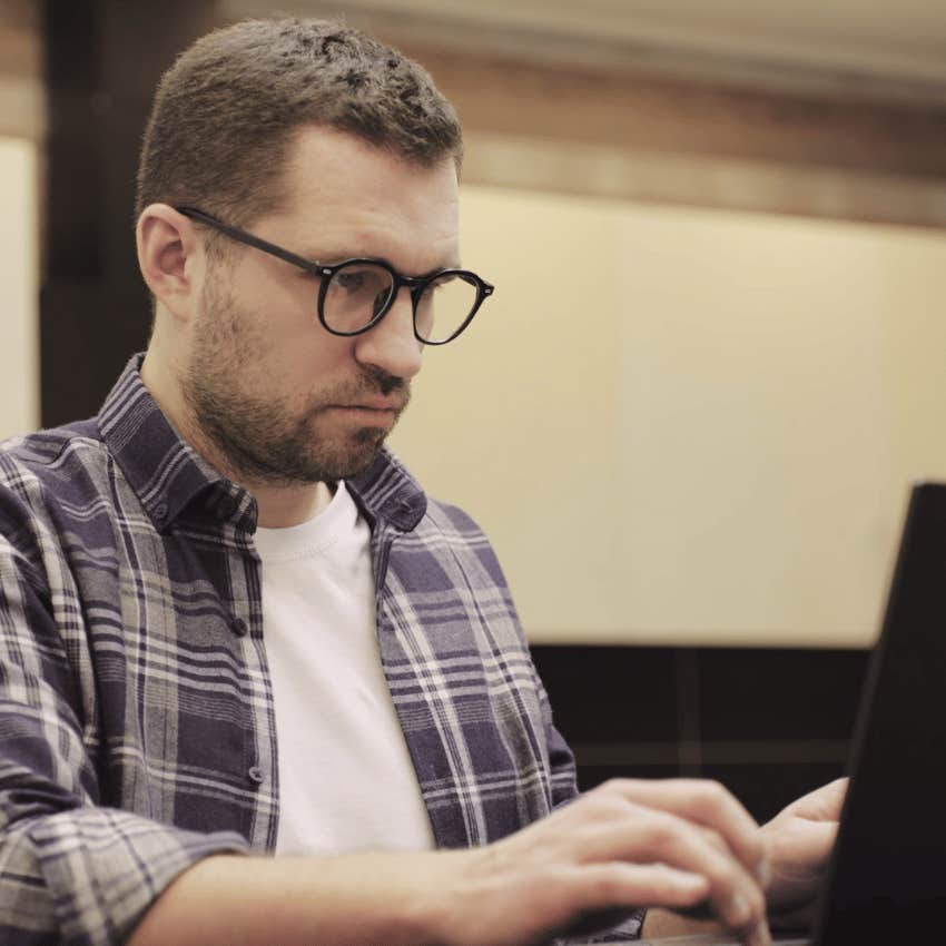man typing let me know is this is good on his laptop to co-worker