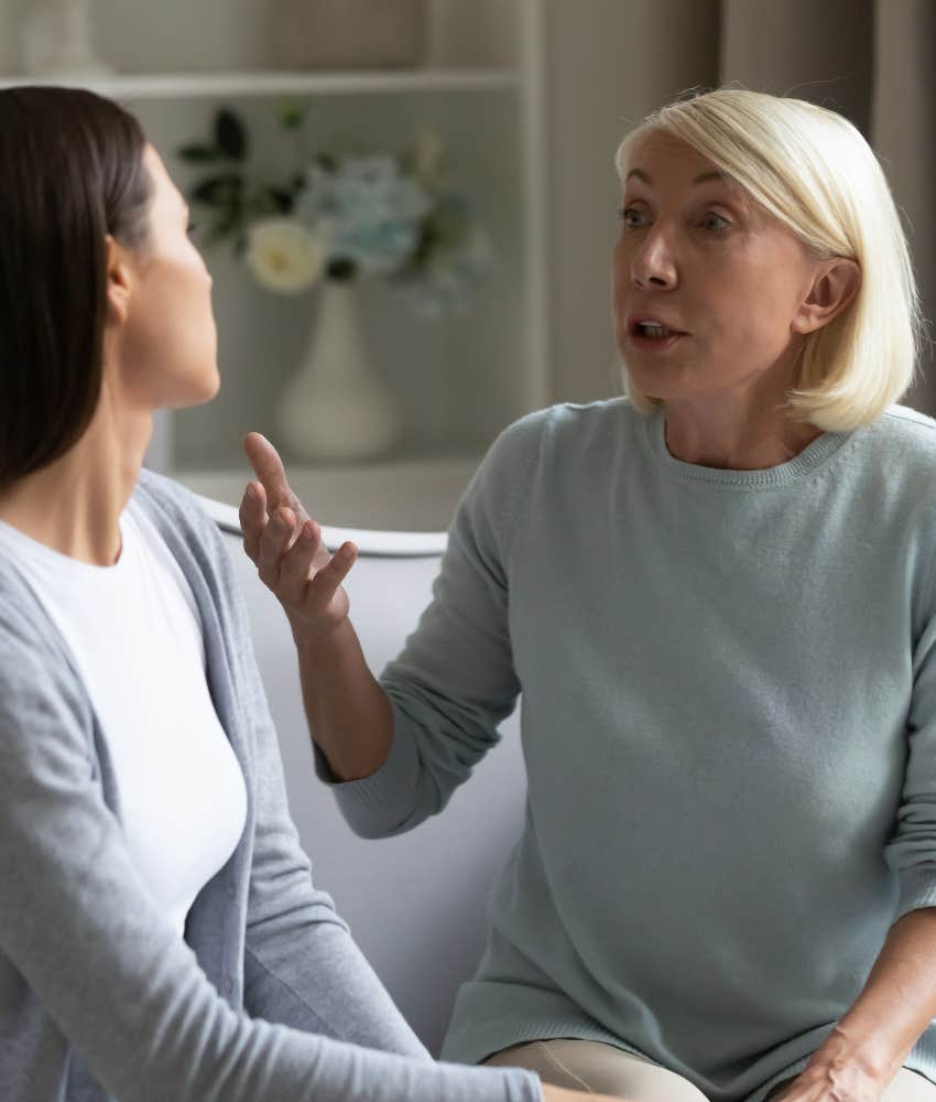 angry elder mother scolds adult child showing toxic phrase