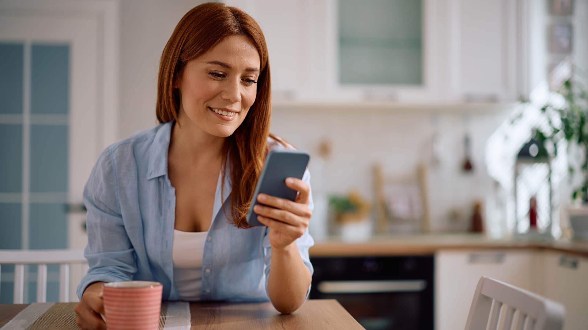 woman checking phone but not replying to messages