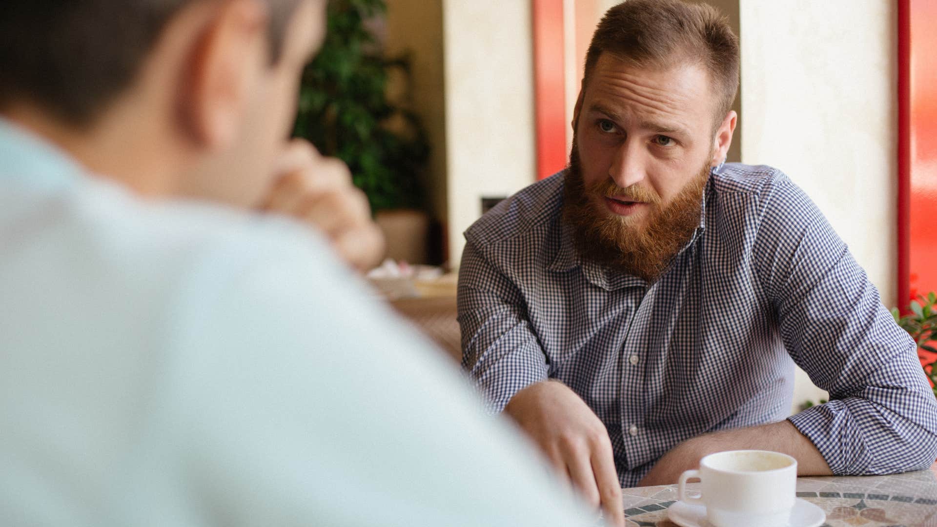 intelligent man debating friend for fun