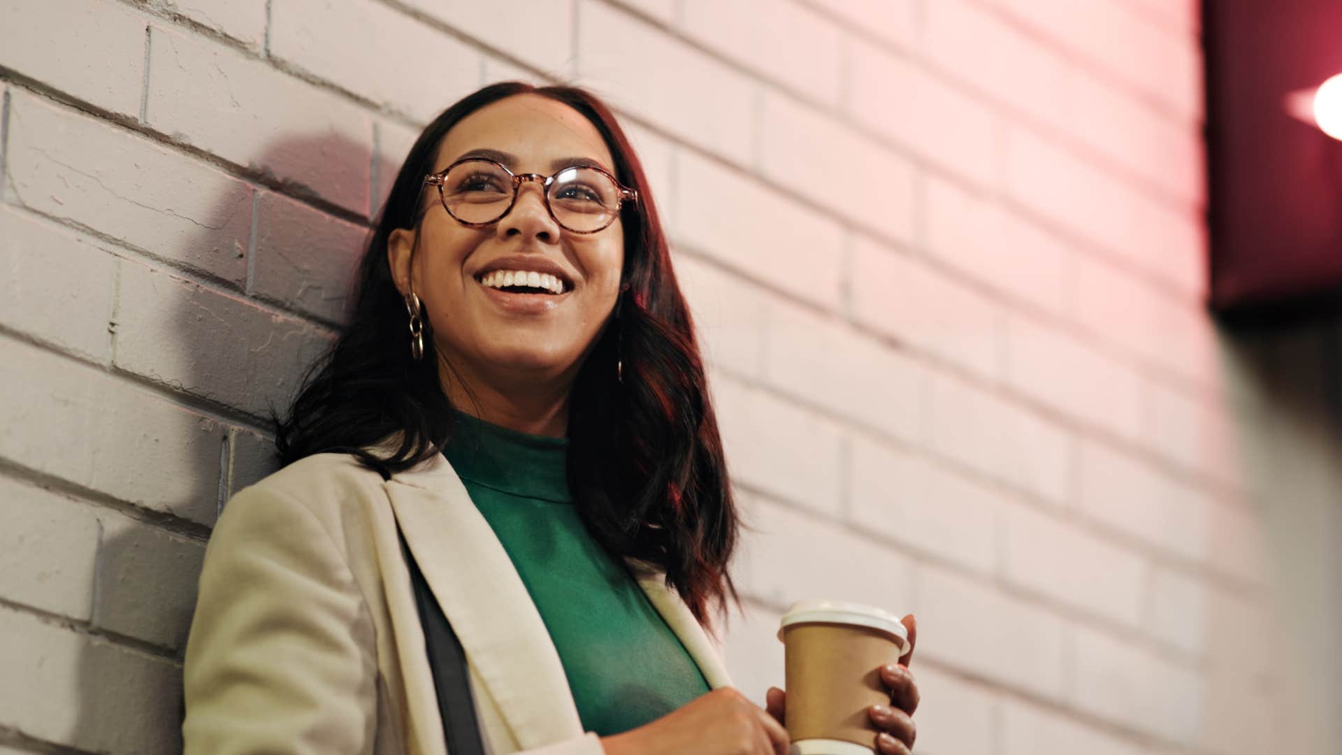 high iq woman smiling thinking about tackling challenges in her life