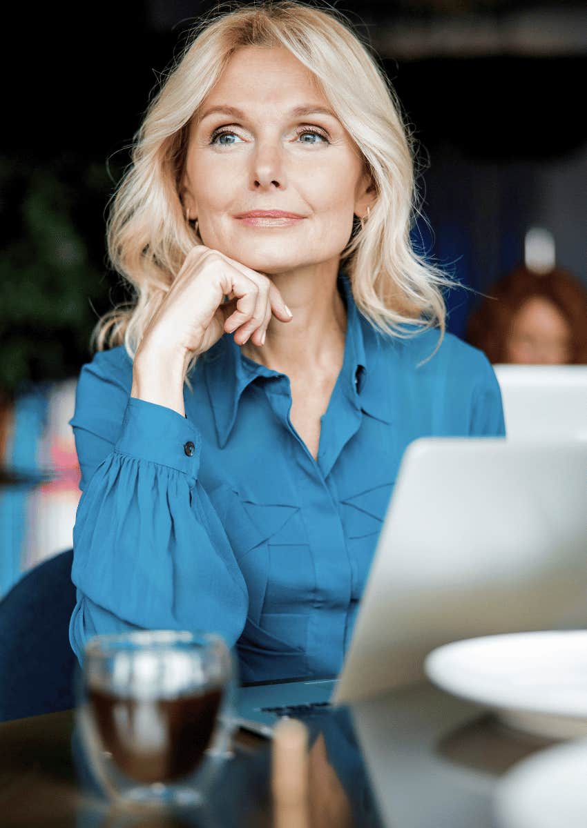 thoughtful mature woman sitting alone