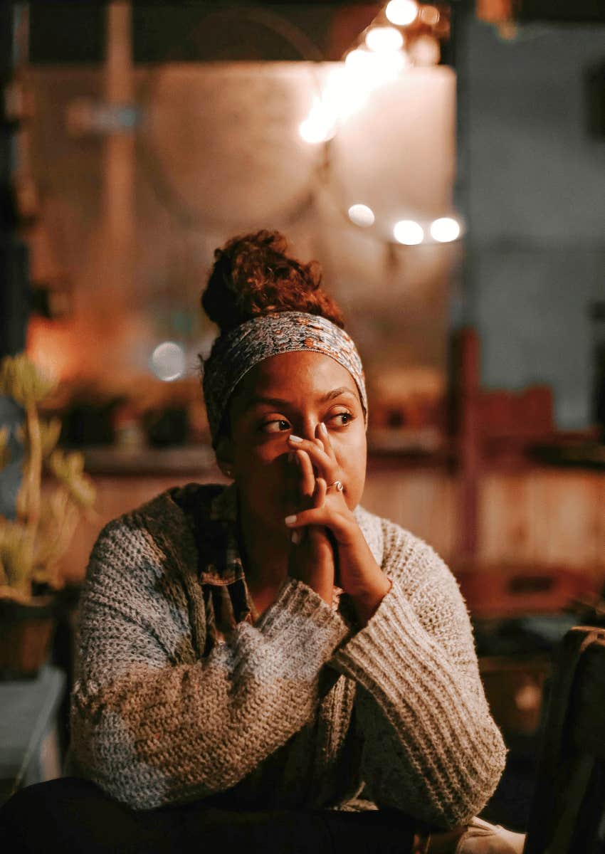thoughtful woman letting go of her past