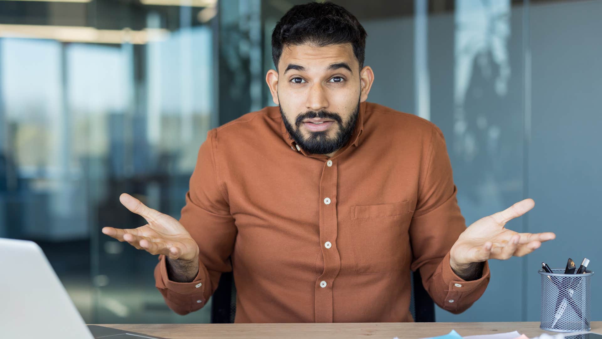 man who lacks common sense shrugging not doing his own research