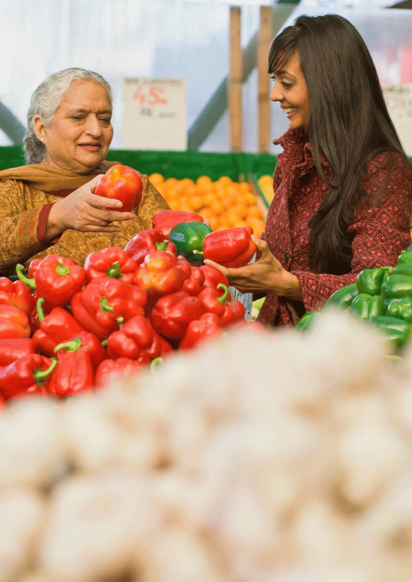 two women talking in the grocery store
