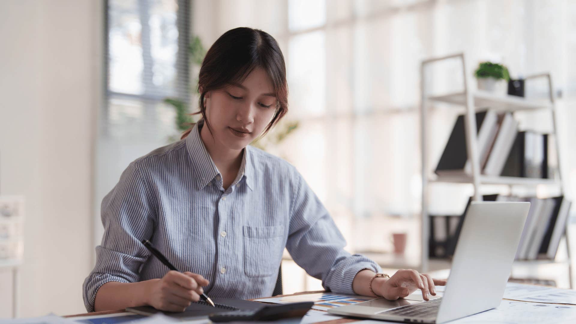 woman texting her parents that she's been really busy